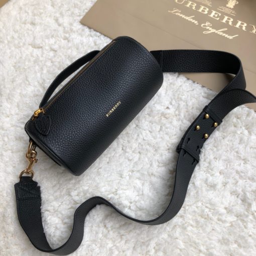 BURBERRY The Leather Barrel Bag. Original Quality Bag including gift box, care book, dust bag, authenticity card. A cylindrical micro bag in block-color leather. Use the military-inspired belt strap to carry it crossbody or on the shoulder. | CRIS&COCO Authentic Quality Designer Bag and Luxury Accessories