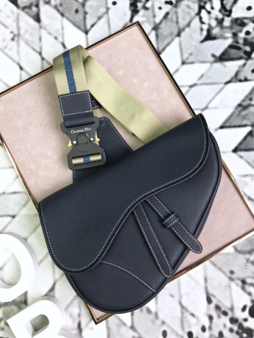 DIOR Men Kim Jones Saddle Leather Bag. Original Quality Bag. Authentic Style. Genuine Calf Leather. Metal Hardware. Authentic Packaging. Original Quality Dust Bag. The iconic DIOR saddle bag made its first appearance at the women’s spring/summer ready-to-wear show in 2000. In December 2018, DIOR MEN designer Kim Jones brought the bag out for his second show in Tokyo, transforming it into an accessory of the future. A real update of the piece, which found its continuation in the autumn/winter 19 collection Dior presented during Paris Fashion Week. | CRIS&COCO | High Quality Designer Handbag