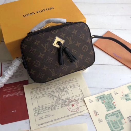 LOUIS VUITTON Saintonge Monogram Canvas Crossbody Bag. Original Quality Bag. Authentic calf leather trim and monogram coated canvas. Gold-toned Hardware. LOUIS VUITTON Sales Box and Dust Bag. Booklet, Authenticity Card, Payment Slip. Monogram canvas and smooth calfskin combine in the Saintonge, a compact bag with a youthful vibe. The leather lends contrast and volume to the design, and the tassels are a playful touch. With its top handle and long strap, the bag can be worn with top handle or as crossbody and shoulder bag. | CRIS&COCO | High quality designer bags and authentic luxury