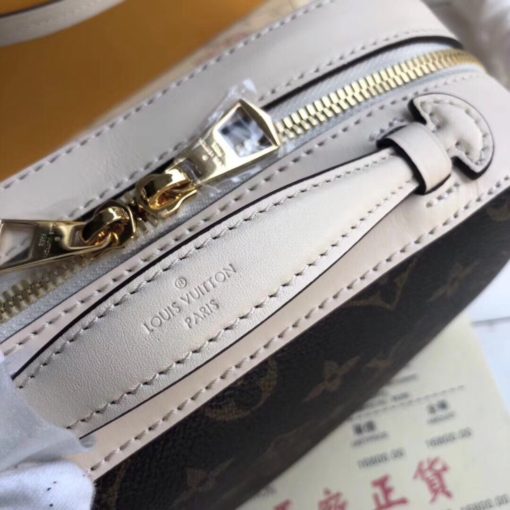 LOUIS VUITTON Saintonge Monogram Canvas Crossbody Bag. Original Quality Bag. Authentic calf leather trim and monogram coated canvas. Gold-toned Hardware. LOUIS VUITTON Sales Box and Dust Bag. Booklet, Authenticity Card, Payment Slip. Monogram canvas and smooth calfskin combine in the Saintonge, a compact bag with a youthful vibe. The leather lends contrast and volume to the design, and the tassels are a playful touch. With its top handle and long strap, the bag can be worn with top handle or as crossbody and shoulder bag. | CRIS&COCO | High quality designer bags and authentic luxury