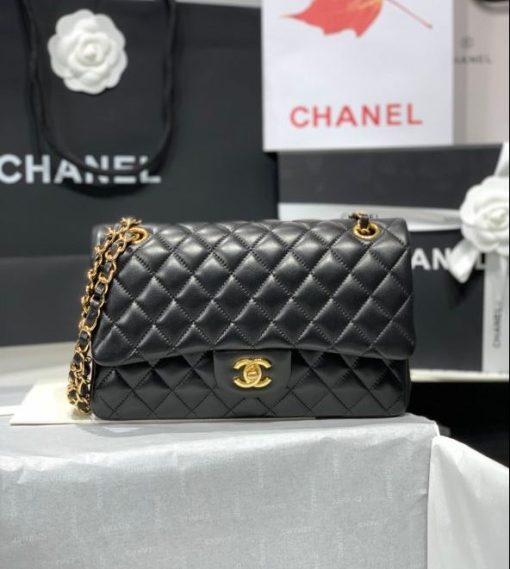 CHANEL Medium Classic Flap Bag. Original Quality Bag. CHANEL Sales Box and Dust Bag. Booklet, Authenticity Card, Payment Slip. Whether you’re a young celeb looking to carry a flashy mini bag in front of the paparazzi or a corporate maven looking for a roomy day bag that announces that you’ve arrived. Many sizes, colors and variations on the Classic Flap mean that there’s likely a version that will suit your purposes. The bags tend to hold their value well for years. | CRIS&COCO | High quality designer bags and authentic luxury