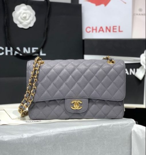 CHANEL Medium Classic Flap Bag. Original Quality Bag. CHANEL Sales Box and Dust Bag. Booklet, Authenticity Card, Payment Slip. Whether you’re a young celeb looking to carry a flashy mini bag in front of the paparazzi or a corporate maven looking for a roomy day bag that announces that you’ve arrived. Many sizes, colors and variations on the Classic Flap mean that there’s likely a version that will suit your purposes. The bags tend to hold their value well for years. | CRIS&COCO | High quality designer bags and authentic luxury