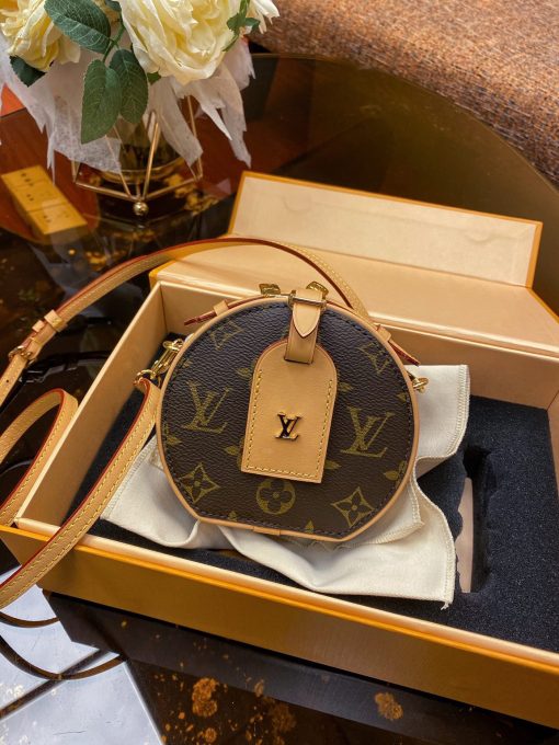 LOUIS VUITTON Mini Boîte Chapeau. Original Quality Bag. Dust bag, sales box, authenticity card. Shoes get bigger, bags get smaller, yes, that has been pretty much the trend as far as the last few years have been. And speaking of small bags, here’s something new for you to obsess over, Louis Vuitton’s Mini Boîte Chapeau. Inspired by Nicolas Ghesquière’s interpretation of the Boîte à Chapeaux, this adorable bag brings glamour to this distinctive shape. It can be worn on as a belt bag thanks to the belt loop or as a crossbody or shoulder bag thanks to the removable strap. An adorable day-to-evening bag. Small yet practical. | CRIS&COCO | High quality designer bags and authentic luxury