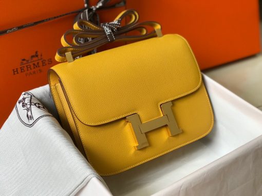 HERMÈS Constance Shoulder Bag. Authentic Quality Bag with literature, dust bag, box and authenticity card. Designed by in-house designer Catherine Chaillet, and named after her daughter, the Hermes Constance Bag is pure elegance. It features sleek lines, a fully adjustable strap, and the iconic “H” clasp. The Constance is a simply, elegant shoulder bag with a long leather strap that can be doubled. | CRIS&COCO Authentic Quality bags and Accessories