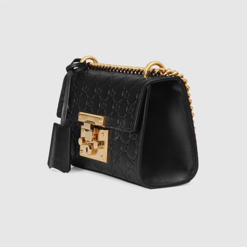 GUCCI Padlock GG Shoulder Bag. Original Quality Bag with literature, dust bag, gift box, and authenticity card. Crafted from smooth calf leather and the label's iconic GG-printed canvas, the Padlock shoulder bag from Gucci is an investment piece that will prove its worth. The bag is given a classic, glamorous finish with gold-tone hardware for the ultimate sophisticated touch. Carry it over your shoulder as a crossbody or in the crook of your arm. | CRIS&COCO Authentic Quality bags and Accessories