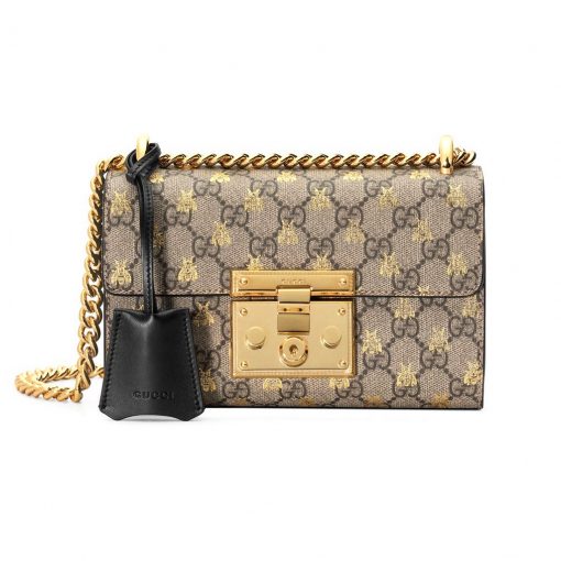 GUCCI Padlock GG Shoulder Bag. Original Quality Bag with literature, dust bag, gift box, and authenticity card. Crafted from smooth calf leather and the label's iconic GG-printed canvas, the Padlock shoulder bag from Gucci is an investment piece that will prove its worth. The bag is given a classic, glamorous finish with gold-tone hardware for the ultimate sophisticated touch. Carry it over your shoulder as a crossbody or in the crook of your arm. | CRIS&COCO Authentic Quality bags and Accessories