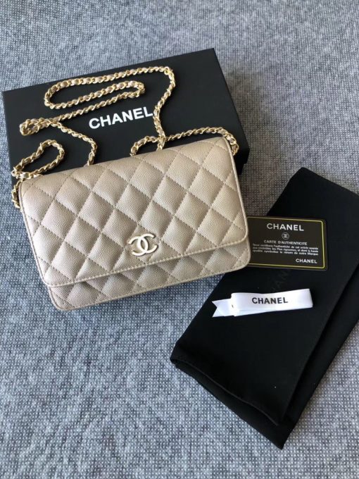 CHANEL Classic Wallet on Chain. Authentic Quality Wallet, including gift box, literature, dust bag, authenticity card. Classic and elegant, a Chanel bag is a fashion statement to your outfit, as seen in this caviar leather flap wallet on chain. Featuring a diamond quilted finish, metal-tone hardware, a foldover top, an internal zipped pocket, an internal slip pocket, an internal logo stamp, a back slip pocket, tortoiseshell details, and a CC turn-lock fastening. | CRIS AND COCO Authentic Quality Designer Bags and Luxury Accessories