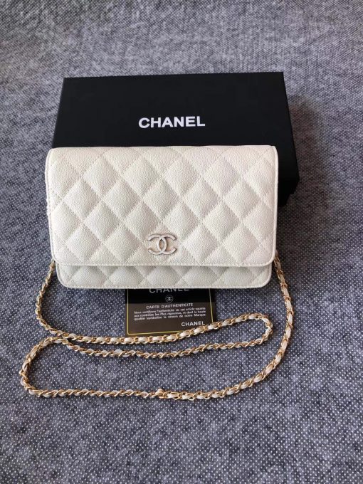 CHANEL Classic Wallet on Chain. Authentic Quality Wallet, including gift box, literature, dust bag, authenticity card. Classic and elegant, a Chanel bag is a fashion statement to your outfit, as seen in this caviar leather flap wallet on chain. Featuring a diamond quilted finish, metal-tone hardware, a foldover top, an internal zipped pocket, an internal slip pocket, an internal logo stamp, a back slip pocket, tortoiseshell details, and a CC turn-lock fastening. | CRIS AND COCO Authentic Quality Designer Bags and Luxury Accessories