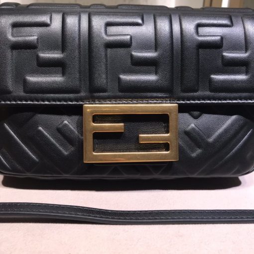 FENDI Baguette Mini. Original Quality Bag including gift box, literature, dust bag, authenticity card. The original It Bag is back. As the trend for everything the Nineties rolls on, it’s only right that Fendi’s iconic Baguette bag, which was created in 1997, has another turn in the spotlight. At the time, the Baguette quickly transcended any previous bag trends and became a phenomenon with women desperate to own as many designs as possible. There had never been such a fashionable yet high-end bag - yes, there were classics like Chanel’s 2.55 and Hermes’ Kelly and Birkin styles but the Baguette was new and fashion-led. | CRIS&COCO Affordable Luxury