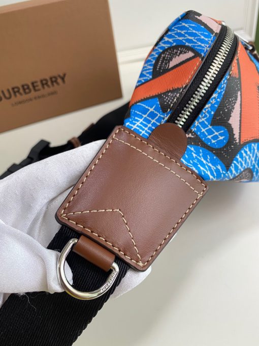 BURBERRY Monogram Print E-Canvas Sonny Bum Bag. Original Quality Bag including gift box, care book, dust bag, authenticity card. A 1990s streetwear staple reimagined in e-canvas – an environmentally conscious canvas, primarily made using renewable resources that require less water and generate less CO2 than conventional coated canvases. The design is animated with a graphic Monogram print. Carry it crossbody, by the strap or around the waist. | CRIS&COCO Authentic Quality Designer Bags and Luxury Accessories