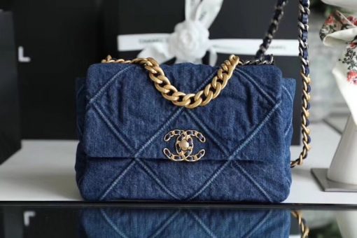 Chanel '19' Flap Bag in Blue Denim 2020. Original Quality Bag including gift box, care book, dust bag, authenticity card. This gorgeous Chanel '19' Flap Bag in Blue Denim is the most sought after bag this year by CHANEL. Gorgeous and so on-trend. Guaranteed authentic and comes with proof of purchase! Please be advised that this is the Larger size, not the medium. Sold out globally. This style is no longer available from Chanel and discontinued in denim. A great investment piece. | CRIS&COCO Authentic Quality Designer Bag and Luxury Accessories