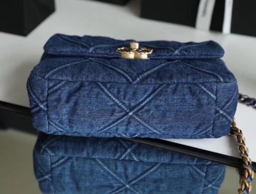 Chanel '19' Flap Bag in Blue Denim 2020. Original Quality Bag including gift box, care book, dust bag, authenticity card. This gorgeous Chanel '19' Flap Bag in Blue Denim is the most sought after bag this year by CHANEL. Gorgeous and so on-trend. Guaranteed authentic and comes with proof of purchase! Please be advised that this is the Larger size, not the medium. Sold out globally. This style is no longer available from Chanel and discontinued in denim. A great investment piece. | CRIS&COCO Authentic Quality Designer Bag and Luxury Accessories