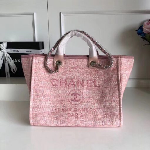 CHANEL Large Deauville Shopping Bag 2021. Authentic quality bag including gift box, booklet, dust bag, authenticity card. The CHANEL Deauville tote matured to a signature CHANEL bag. The bestseller Deauville often appears in seasonal launches in unexpected colors and materials. On the CHANEL website, Chanel calls it the Shopping Bag, but if you walk into a CHANEL boutique and ask for the Deauville, you will be directed to this tote bag. | Cris and Coco Authentic Quality Designer Bags and Luxury Accessories