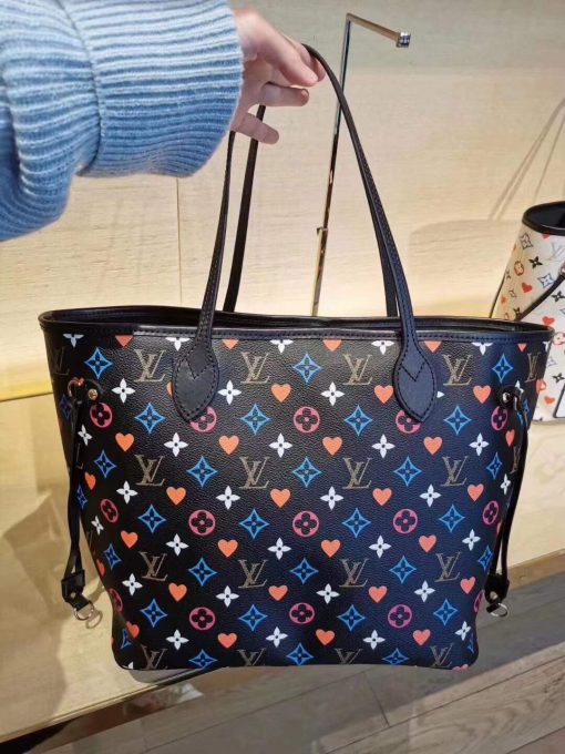 LOUIS VUITTON Game On Neverfull MM Tote Bag. Original Quality Bag including gift box, care book, dust bag, authenticity card. For Cruise 2021, Nicolas Ghesquière fashions the Neverfull MM tote bag in Monogram canvas adorned with a bold print blending Monogram Flowers and symbols of playing card suits. With a new outside pocket that looks like a playing card and another on the removable zipped pouch, this versatile tote becomes a playful homage to gaming.. | CRIS&COCO Authentic Quality Designer Bags and Luxury Accessories