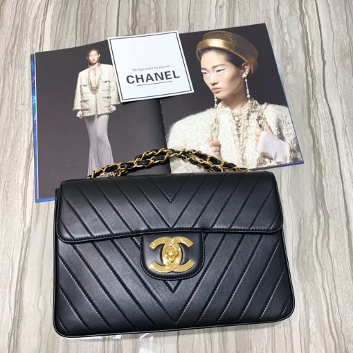 CHANEL Classic Flap Jumbo Bag. Original Quality Bag including gift box, care book, dust bag, authenticity card. Chanel Classic Mademoiselle Chain Lambskin Flap Bag. This quintessential Chanel must-have is marked with the iconic CC buckle and adorned with the stunning all gold-plated Mademoiselle Chain straps. This is the classic you love with a twist. Wear it as a clutch, on the shoulder or even cross-body for hands-free convenience. | CRIS&COCO Authentic Quality Designer Bags and Luxury Accessories