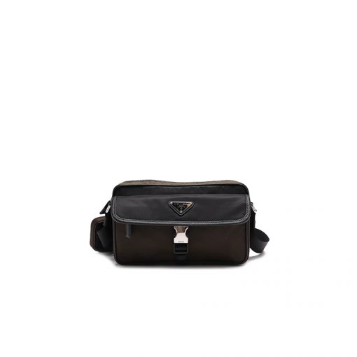 PRADA Nylon Cross-Body Bag. Original Quality Bag including gift box, care book, dust bag, authenticity card. This bag decorated with Saffiano leather trim presents compact volumes and a sleek design. With its distinctive side release buckle on the front, it comes with an easily adjustable shoulder strap. This cross-body bag featuring Saffiano leather trim with metal hardware and Prada logo lining, logo tag inside, enameled metal triangle logo outside. It has a main compartment with zipper, secondary compartment with flap and side release buckle, two front pockets, including one with zipper. | CRIS&COCO Authentic Quality Designer Bags and Luxury Accessories