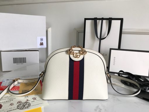 GUCCI Ophidia GG Small Rounded Top Shoulder Bag. Original Quality Bag including gift box, care book, dust bag, authenticity card. This rounded top shoulder bag is a heritage-inspired addition to accessories edit. Complete with the label's signature motifs – GG Supreme print, green and red Web, and golden-tone hardware – it's a perfect modern interpretation of coveted vintage pieces. Carry the runway design with tailored looks for effortless workwear style. | CRIS&COCO Authentic Quality Designer Bags and Luxury Accessories