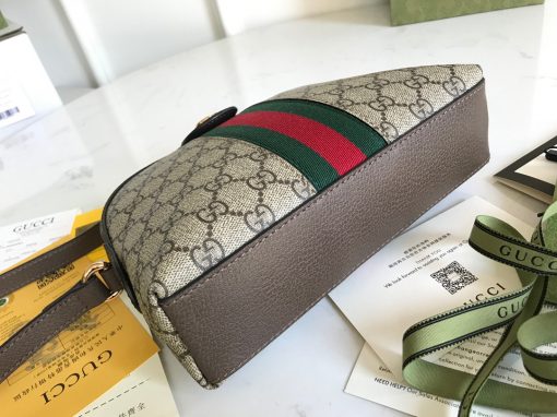 GUCCI Ophidia GG Small Rounded Top Shoulder Bag. Original Quality Bag including gift box, care book, dust bag, authenticity card. This rounded top shoulder bag is a heritage-inspired addition to accessories edit. Complete with the label's signature motifs – GG Supreme print, green and red Web, and golden-tone hardware – it's a perfect modern interpretation of coveted vintage pieces. Carry the runway design with tailored looks for effortless workwear style. | CRIS&COCO Authentic Quality Designer Bags and Luxury Accessories