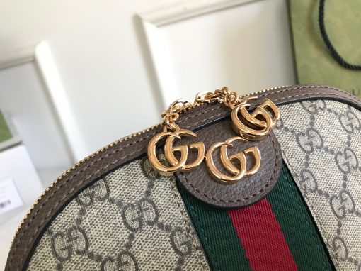 GUCCI Ophidia GG Small Rounded Top Shoulder Bag. Original Quality Bag including gift box, care book, dust bag, authenticity card. This rounded top shoulder bag is a heritage-inspired addition to accessories edit. Complete with the label's signature motifs – GG Supreme print, green and red Web, and golden-tone hardware – it's a perfect modern interpretation of coveted vintage pieces. Carry the runway design with tailored looks for effortless workwear style. | CRIS&COCO Authentic Quality Designer Bags and Luxury Accessories