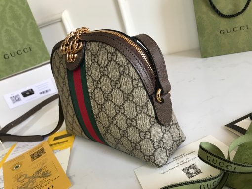 GUCCI Ophidia GG Small Rounded Top Shoulder Bag. Original Quality Bag including gift box, care book, dust bag, authenticity card. This rounded top shoulder bag is a heritage-inspired addition to accessories edit. Complete with the label's signature motifs – GG Supreme print, green and red Web, and golden-tone hardware – it's a perfect modern interpretation of coveted vintage pieces. Carry the runway design with tailored looks for effortless workwear style. | CRIS&COCO Authentic Quality Designer Bags and Luxury Accessories