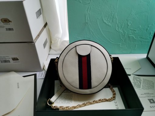 GUCCI GG Marmont Mini Leather Round Shoulder Bag. This Gucci GG Marmont mini round shoulder bag certainly seems to fit the bill! Mini bags are hot this season and we could be more supportive of this trend. This bag from Gucci is only for essentials, the phone will be on your hands, the credit card in your pocket and your lipstick have a 24-hour duration. Crafted from plain/quilted leather, this fun-size accessory has a chain and leather shoulder strap and is adorned with the signature metal GG logo. All the best things come in small packages. Featuring a top zip fastening and gold-tone/silver-tone hardware.| CRIS&COCO Authentic Quality Designer Bags and Luxury Accessories