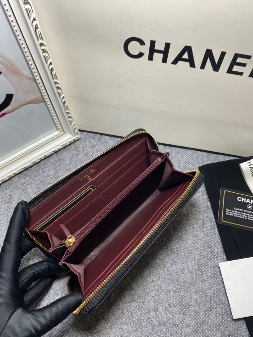 CHANEL Classic Long Zipped Wallet.  Original Quality Wallet including gift box, care book, dust bag, authenticity card. This wallet is one of the signature wallets of Chanel. It has been around for some time now and it will continue to stick around. This wallet is practical and amazing; perfect to hold paper money, credit cards and coins. The classic black color, you will get the signature burgundy colored interior. | CRIS&COCO Authentic Quality Designer Bags and Luxury Accessories