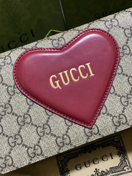 GUCCI GG Supreme Canvas Heart Logo Bag.