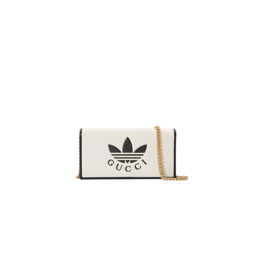 GUCCI X ADIDAS Wallet With Chain.  Original Quality Wallet including gift box, care book, dust bag, authenticity card. Part of the GUCCI X ADIDAS collection, this chain wallet features the Gucci Trefoil print. Emblematic House’s motifs mix with those of the historic sportswear brand adidas. The collection sees both heritages encoded in a trio of lines, where adidas and Gucci combine archival emblems. Creative Director, Alessandro Michele pulls inspiration from his memories of the ‘80s and ‘90s for a collection that is both nostalgia-driven and contemporary. | CRIS&COCO Authentic Quality Designer Bag and Luxury Accessories