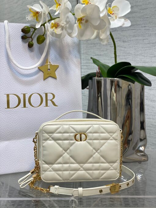 DIOR Caro Box Bag With Chain. Original Quality Bag including gift box, care book, dust bag, authenticity card. Maria Grazia Chiuri's Dior Caro box bag with chain is a modern creation. Crafted in calfskin, it stands out with a unique Macrocannage quilted effect and a spacious compartment, including three card slots, to accommodate all the daily essentials. The removable chain strap features a leather insert for comfortable and adjustable wear, either over the shoulder or crossbody, while the handle allows it to be carried by hand. | CRIS&COCO Authentic Quality Designer Bag and Luxury Accessories