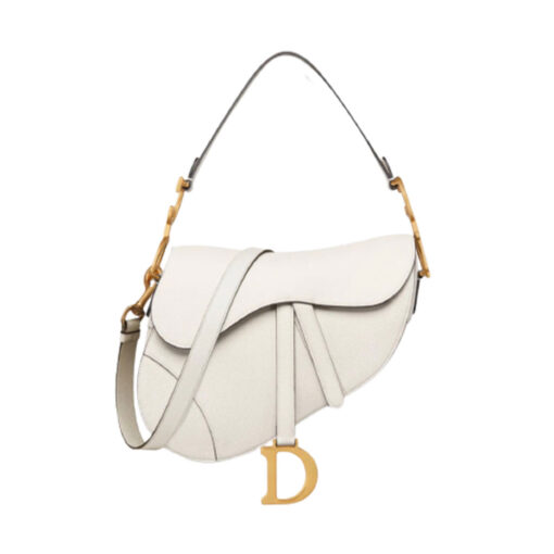 DIOR Saddle Bag With Strap. Original Quality Bag including gift box, care book, dust bag, authenticity card. Maria Grazia Chiuri brings a fresh update to the iconic Saddle bag. Crafted in grained calfskin, the legendary design features a Saddle flap with a magnetic 'D' stirrup clasp, as well as an antique gold-finish metal 'CD' signature on either side of the strap. Featuring a thin, adjustable and removable shoulder strap, the Saddle bag may be carried by hand, worn over the shoulder or crossbody. | CRIS&COCO Authentic Quality Designer Bag and Luxury Accessories