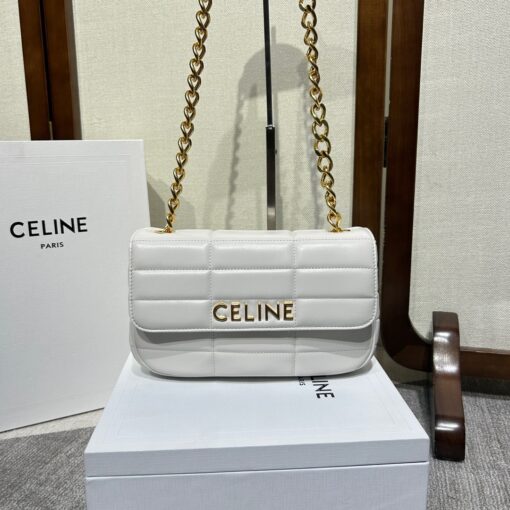 CELINE Matelasse Monochrome Chain Shoulder Bag. Original Quality Bag including gift box, care book, dust bag, authenticity card. This shoulder bag is enwrapped with a fresh graphic goatskin quilting and metal lettering in the monochrome Celine logo, adorned with an oversized chain strap, allowing the bag to be worn cross-body depending on the desires of the wearer. | CRIS&COCO Authentic Quality Designer Bag and Luxury Accessories