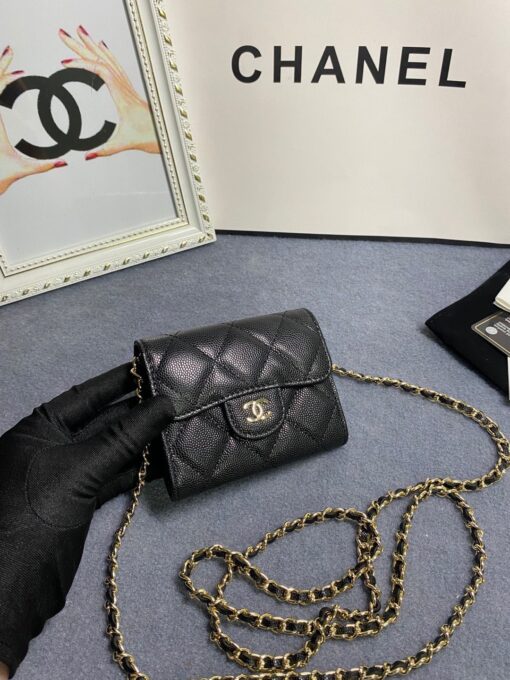 CHANEL Classic Mini Clutch With Chain. Original Quality Bag including gift box, care book, dust bag, authenticity card. The Chanel Classic Mini Clutch is the true authentic beauty because it resembles the Classic Flap Bag. It’s also the mini version of the Clutch With Chain Bag. This Mini Clutch is really tiny. But tiny has its advantage because it can be used in numerous ways. Especially this handbag as it comes with a long chain for shoulder carry. This one can be used as an extra wallet inside your bag. At night it can be carried as an adorable evening accessory. | CRIS&COCO Authentic Quality Designer Bags and Luxury Accessories