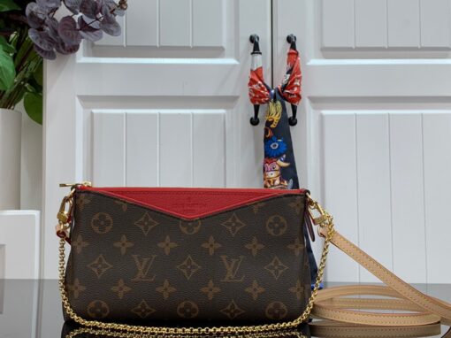 LOUIS VUITTON Pallas Clutch Bag. Original Quality Bag including gift box, care book, dust bag, authenticity card. It’s covered in Monogram Canvas and has multiple carry options like on your shoulder or even cross body. Make use of the leather strap or the golden chain. Use it as a Wallet on Chain bag, it’s just ideal for the evenings or when you want to carry a small but gorgeous handbag. Also, it matches to every casual outfit. This Clutch Bag is refined with golden color metallic pieces; it comes with zipped central compartment and an exterior front pocket. | CRIS&COCO Authentic Quality Designer Bags and Luxury Accessories