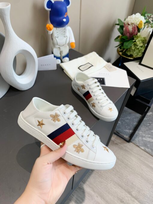 GUCCI Sneaker. Original Quality Sneaker including gift box, care book, dust bag, authenticity card. The classic low-top sneaker in leather with Web detail. These are so great that they would soon become a part of your every day wardrobe. | CRIS&COCO Authentic Quality Designer Bags and Luxury Accessories