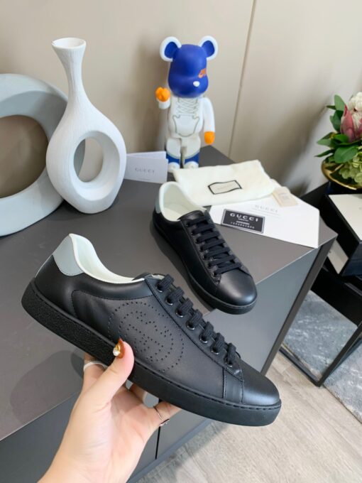 GUCCI Sneaker. Original Quality Sneaker including gift box, care book, dust bag, authenticity card. The classic low-top sneaker in leather with Web detail. These are so great that they would soon become a part of your every day wardrobe. | CRIS&COCO Authentic Quality Designer Bags and Luxury Accessories