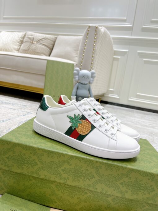 GUCCI Sneaker. Original Quality Sneaker including gift box, care book, dust bag, authenticity card. The classic low-top sneaker in leather with Web detail. These are so great that they would soon become a part of your every day wardrobe. | CRIS&COCO Authentic Quality Designer Bags and Luxury Accessories