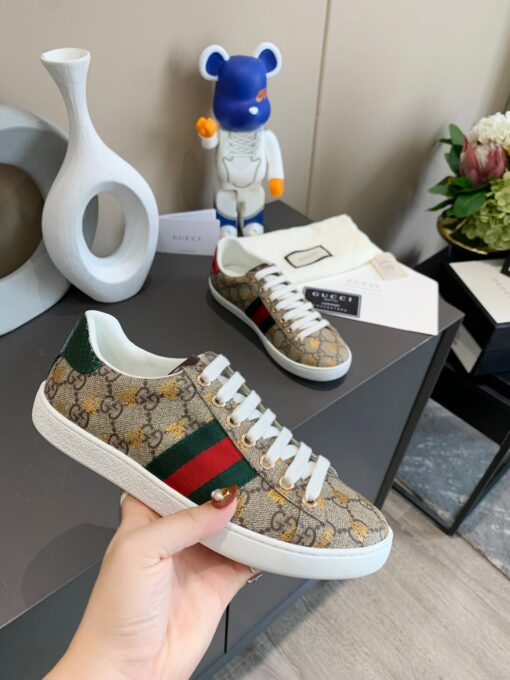 GUCCI Sneaker. Original Quality Sneaker including gift box, care book, dust bag, authenticity card. The classic low-top sneaker in leather with Web detail. These are so great that they would soon become a part of your every day wardrobe. | CRIS&COCO Authentic Quality Designer Bags and Luxury Accessories