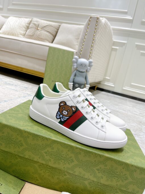 GUCCI Sneaker. Original Quality Sneaker including gift box, care book, dust bag, authenticity card. The classic low-top sneaker in leather with Web detail. These are so great that they would soon become a part of your every day wardrobe. | CRIS&COCO Authentic Quality Designer Bags and Luxury Accessories