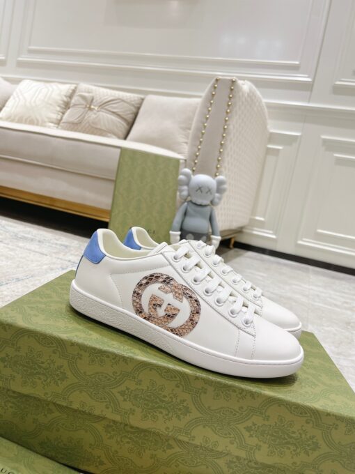 GUCCI Sneaker. Original Quality Sneaker including gift box, care book, dust bag, authenticity card. The classic low-top sneaker in leather with Web detail. These are so great that they would soon become a part of your every day wardrobe. | CRIS&COCO Authentic Quality Designer Bags and Luxury Accessories