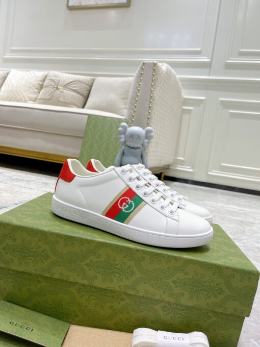 GUCCI Sneaker. Original Quality Sneaker including gift box, care book, dust bag, authenticity card. The classic low-top sneaker in leather with Web detail. These are so great that they would soon become a part of your every day wardrobe. | CRIS&COCO Authentic Quality Designer Bags and Luxury Accessories