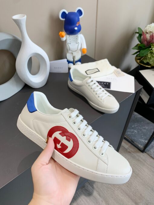 GUCCI Sneaker. Original Quality Sneaker including gift box, care book, dust bag, authenticity card. The classic low-top sneaker in leather with Web detail. These are so great that they would soon become a part of your every day wardrobe. | CRIS&COCO Authentic Quality Designer Bags and Luxury Accessories