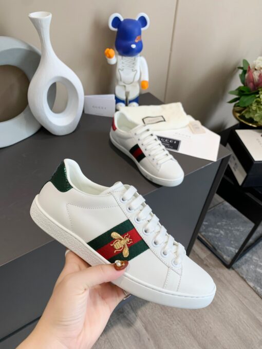 GUCCI Sneaker. Original Quality Sneaker including gift box, care book, dust bag, authenticity card. The classic low-top sneaker in leather with Web detail. These are so great that they would soon become a part of your every day wardrobe. | CRIS&COCO Authentic Quality Designer Bags and Luxury Accessories