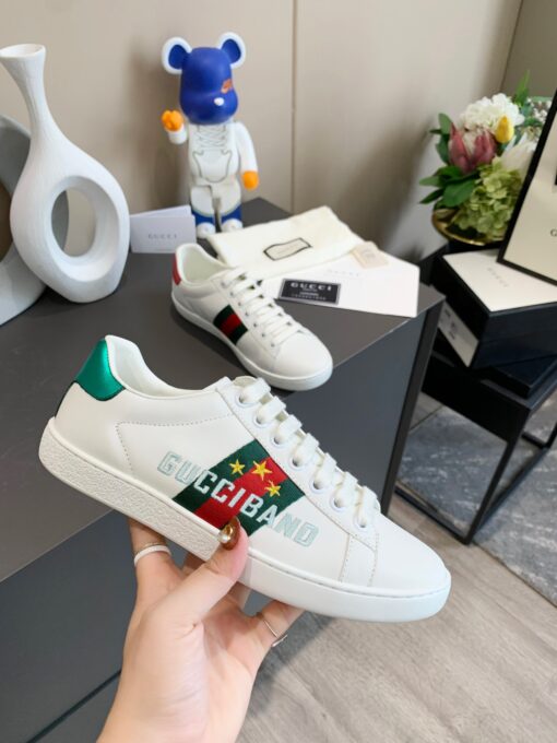 GUCCI Sneaker. Original Quality Sneaker including gift box, care book, dust bag, authenticity card. The classic low-top sneaker in leather with Web detail. These are so great that they would soon become a part of your every day wardrobe. | CRIS&COCO Authentic Quality Designer Bags and Luxury Accessories