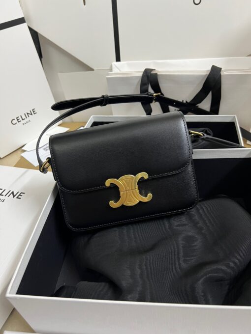 CELINE Teen Triomphe. High-End Quality Bag including gift box, care book, dust bag, authenticity card. In 2018, Hedi Slimane released the original Triomphe to much acclaim. Since then, the stylish purse has been spotted on the arms of celebrities and fashion insiders across the world. With its smooth leather exteriors and minimalistic hardware, the crossbody design reconciles fashion and function, featuring Celine's signature golden Triomphe logo fastener. It has attracted the attention of bag collectors and fashion historians alike for its sophisticated yet simple design. This classic piece has inspired a series of spinoffs, proving its timelessness and forever cementing the Triomphe as a fashion icon. | CRIS AND COCO Authentic Quality Luxury Accessories