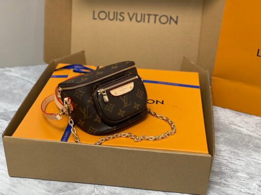 LOUIS VUITTON Mini Bumbag. High-End Quality Bag including gift box, care book, dust bag, authenticity card. Part of Louis Vuitton's Gradient Collection, the Mini Bumbag is an elegant take on the on-trend bag format. Crafted from Monogram Empreinte leather with a stunning printed gradation of colors, this bag will make a stylish addition to your accessory wardrobe. It features a zipped main compartment with a front pocket adorned with a Louis Vuitton leather tag as well as adjustable, removable straps that you can use for either cross-body or shoulder wear. This Mini Bumbag also comes with a stylish, gold-tone chain making it the perfect accessory for any summer occasion. | CRIS AND COCO Authentic Quality Luxury Accessories