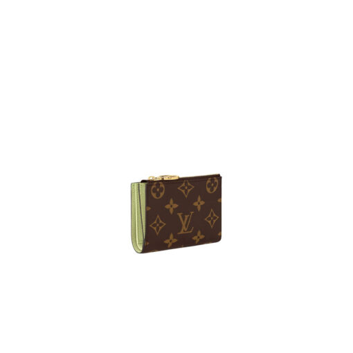 LOUIS VUITTON Lisa Wallet: Elevate Your Everyday with Effortless Elegance. The Lisa wallet showcases an exquisite blend of Monogram canvas adorned with a vibrant leather lining, making it a true testament to luxury and style. Designed with convenience in mind, this compact wallet effortlessly nestles into even the tiniest of bags or clutches, rendering it both practical and chic. What sets this wallet apart is its thoughtfully crafted gusseted coin pocket, embellished with the iconic LV Circle charm on the zipper pull. Delving further within, you'll discover a well-appointed interior featuring a spacious bill compartment, two versatile flat pockets, and four impeccably designed card slots. It's not just a wallet; it's a testament to the artistry of fashion and functionality.