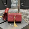 SAINT LAURENT Small 'Kate' Bag with Tassel. Original Quality Bag including gift box, care book, dust bag, authenticity card. Monogram Saint Laurent bag adorned with a curb chain, interlocking YSL initials in metal, and a metallic tassel. Crafted from leather, this Kate shoulder bag from Saint Laurent is decorated with a signature YSL monogram plaque and a hanging tassel detail to the front for an extra refined touch. The perfect go-to for a night out. Featuring a chain shoulder strap, a foldover top with magnetic closure, a main internal compartment, an internal slip pocket, an internal logo patch, an internal logo stamp, and metal hardware.