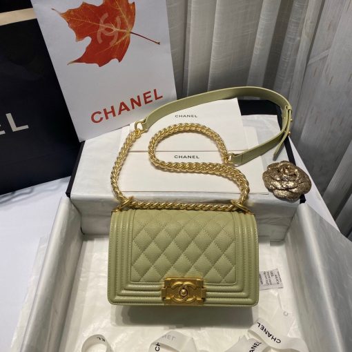 CHANEL Small Boy Handbag. Original Quality Bag including gift box, care book, dust bag, authenticity card. Even though the Boy was only introduced in 2011, the style has quickly achieved the status of an icon. Designed by Karl Lagerfeld and named after Boy Capel, the now legendary love of Coco Chanel’s life, the bag encapsulates masculine chic conveyed through rigid structure, boxy shape and sharp corners. This CHANEL Small Handbag is instantly recognizable for its simple, boxy silhouette and sharp corners, embellished only with a contrasting, bold-looking link chain strap which is the main feature of the bag. This most popular variations of the Chanel Boy are available in either caviar or lambskin. There are no external pockets and the sole adornment is the quilted fascia.