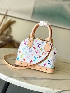 LV x TM Alma BB. Authentic quality luxury bag crafted in genuine leather comes with authenticity card, dust bag and gift bag. A Timeless Icon Reimagined in Murakami’s Playful Palette. Inspired by a 1930s Art Deco design, this special edition of the Alma BB exudes a celebratory charm with its vibrant multicolored Monogram coated canvas from the Louis Vuitton x Murakami collection. Drawing from the Japanese artist’s playful palette, the design is beautifully complemented by the House’s signature natural cowhide leather, which graces the refined Toron top handles, structured base, removable strap, and the exclusive LV x TM keybell—adding a timeless touch of elegance. | PURSE POP UP LIVE LV x TM Alma BB. Authentic quality luxury bag crafted in genuine leather comes with authenticity card, dust bag and gift bag. A Timeless Icon Reimagined in Murakami’s Playful Palette. Inspired by a 1930s Art Deco design, this special edition of the Alma BB exudes a celebratory charm with its vibrant multicolored Monogram coated canvas from the Louis Vuitton x Murakami collection. Drawing from the Japanese artist’s playful palette, the design is beautifully complemented by the House’s signature natural cowhide leather, which graces the refined Toron top handles, structured base, removable strap, and the exclusive LV x TM keybell—adding a timeless touch of elegance.