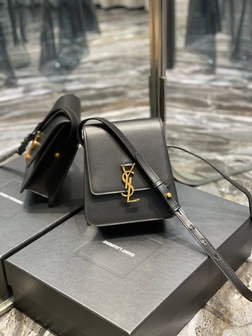 SAINT LAURENT Kaia North/South Shoulder Bag. Original Quality Bag including gift box, care book, dust bag, authenticity card. Saint Laurent's Kaia shoulder bag is named after model Kaia Gerber and was first introduced during the SS20 collection. Finished with refined gold-tone details, this elongated North/South iteration fastens with a magnetic closure and can be worn across the body or on the shoulder thanks to its adjustable strap.